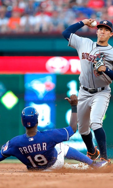 Fielder homers, Rangers top Astros; Correa hurt